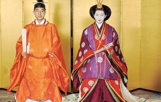 This April 10, 1959 picture shows Japan's Emperor Akihito (L) and Empress Michiko (R) posing for their wedding at the Kashiko Dokoro in Imperial Palace in Tokyo. (Photo by JIJI PRESS / Imperial Household Agency / AFP) / Japan OUT        (Photo credit should read JIJI PRESS/AFP/Getty Images)